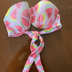 Mismatched watermelon bathing suit.